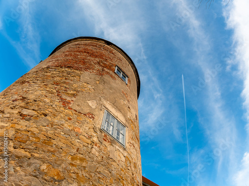 View on the old castle elements at the spring tower door window handle photo
