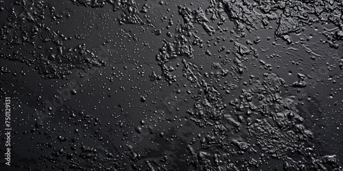 Dark Textured Surface with Water Droplets