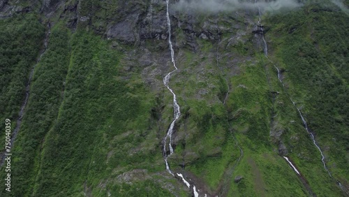 high altitude waterfall from a mountain. drone view. 4k