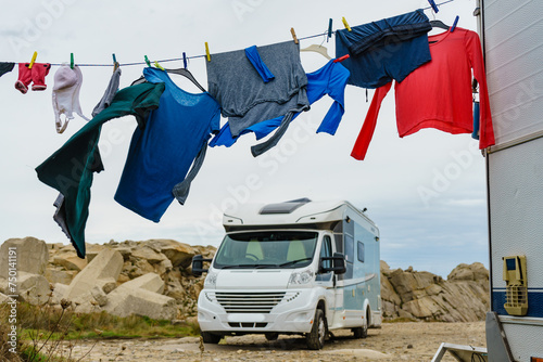 Washing laundry hanging to dry outdoors at caravan photo