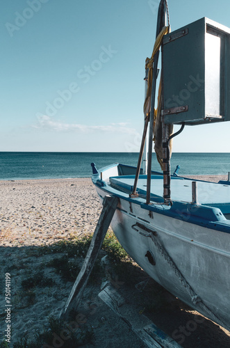A solitary boat on the beach