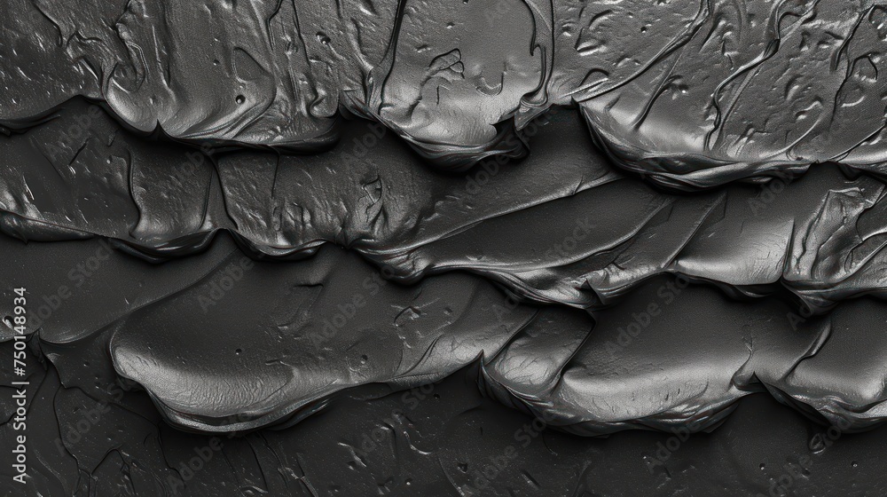 a close up of a black and white photo of water drops on the surface of the surface of the surface.