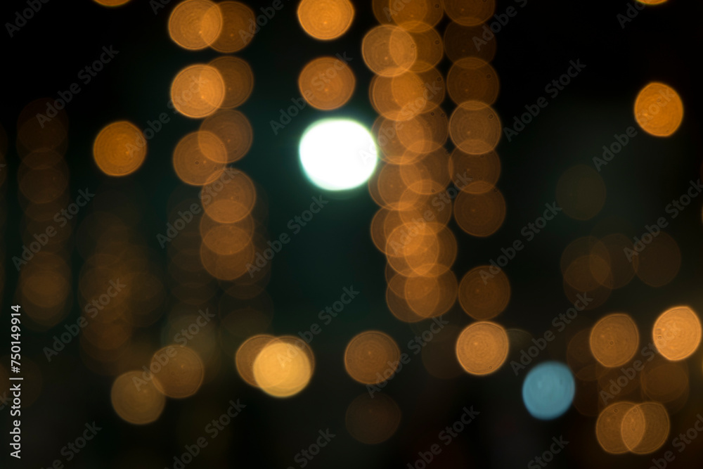 Orange bokeh light nature from tree and sky background is a shiny naturally occurring shadow that is not clear but beautiful.
