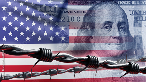 фотографія US flag behind barbed wire