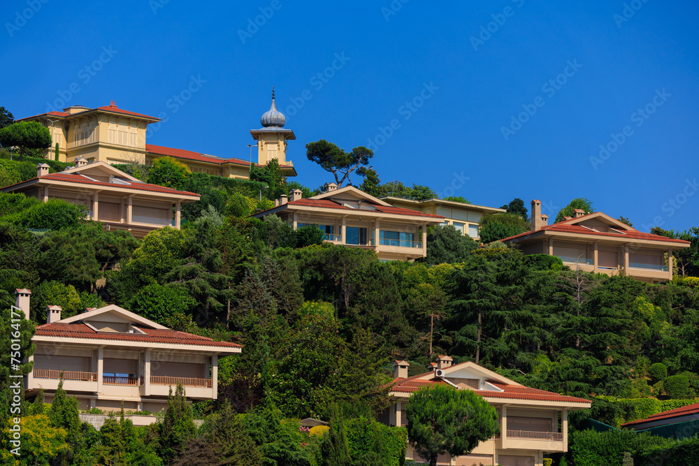 View of buildings and houses in public places in Turkey, sunny summer day View of buildings and houses in public places in Turkey, sunny summer day
