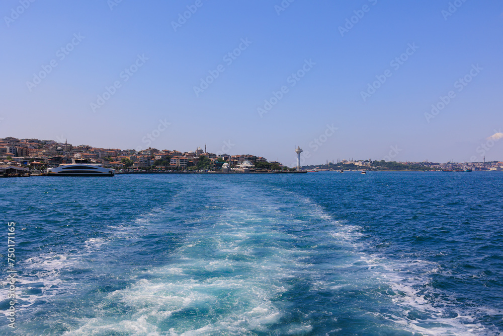 View from the water to buildings in the city of Istanbul 