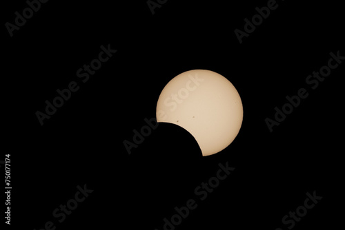 Partial solar eclipse with sun spots captured during the annular solar eclipse in San Antonio, Texas, USA photo