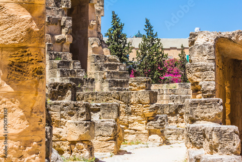 Details of the amphitheater in El Jem in Tunisia. The amphitheatre of El Jem is the only one in the Roman world to be built entirely from dressed stone, without the use of bricks.  photo