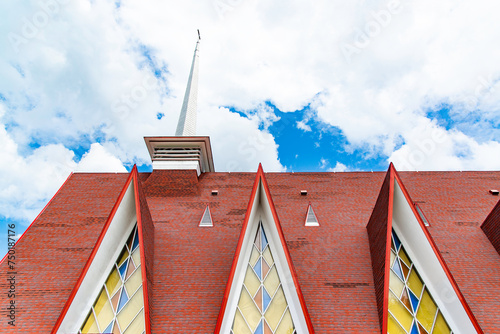 Tadoussac, Canada - July 23 2021: Red Roof of Presbytere De Tadoussac photo