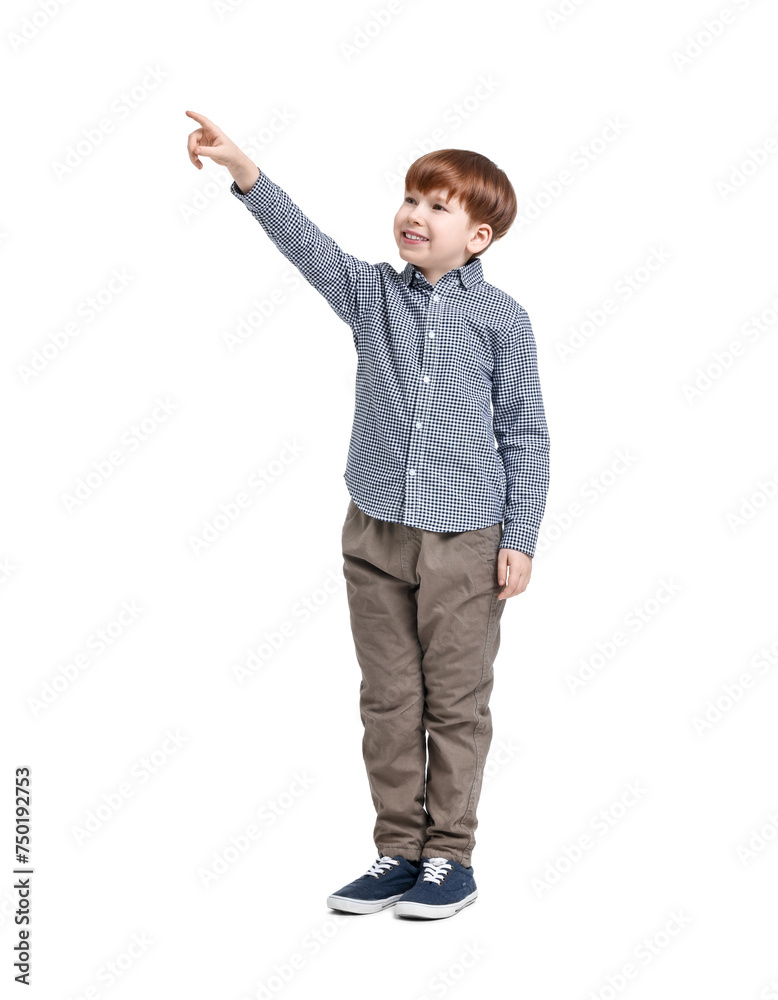 Little boy pointing at something on white background Little boy pointing at something on white background