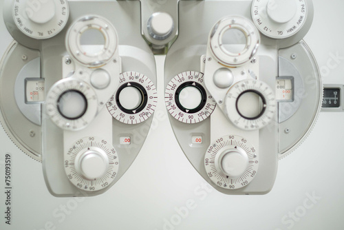 close up of phoropter, specialized instrument used in eye examinations to measure refractive errors and determine eyeglass prescriptions, eye medical clinic