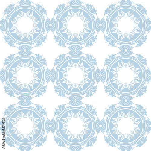 Blue and white patterned surface with geometric shapes