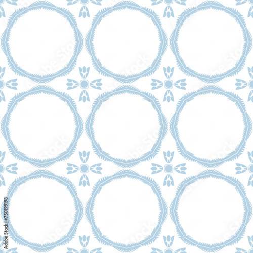 Blue and white patterned surface with geometric shapes