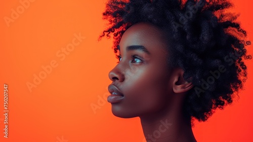  a close up of a person's head with an orange background and an orange background with a black woman's face and a red background with an orange background.