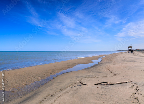 Fototapeta Naklejka Na Ścianę i Meble -  Typical sandy beach of Margherita di Savoia town in Apulia region, southern  Italy.