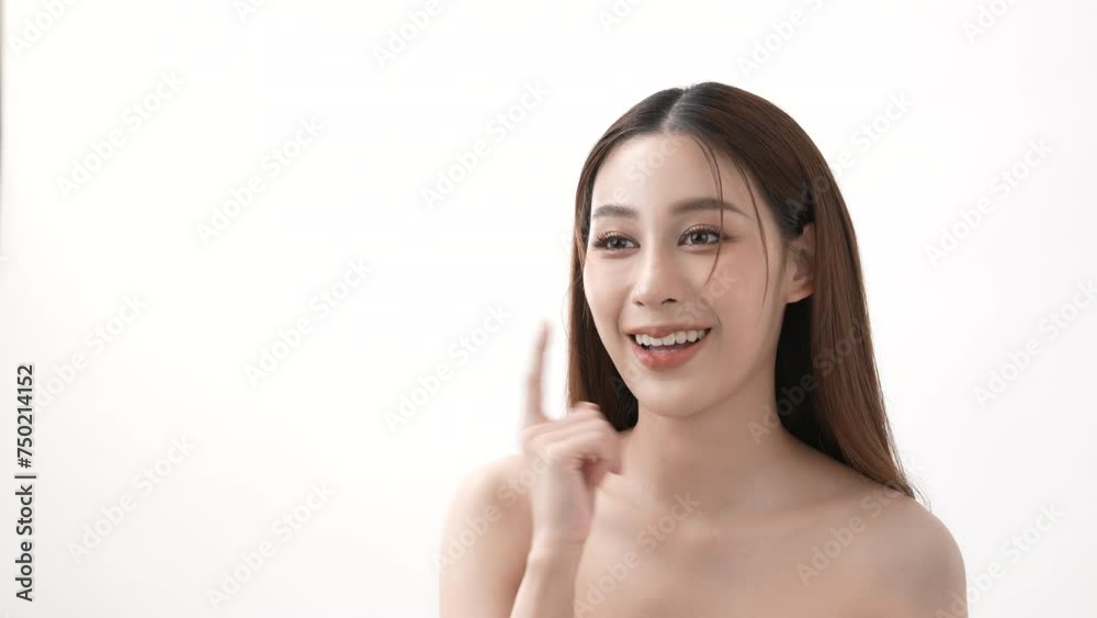 Beauty concept of 4k Resolution. Asian girl is touching her face on a white background. Beauty concept of 4k Resolution. Asian girl is touching her face on a white background.