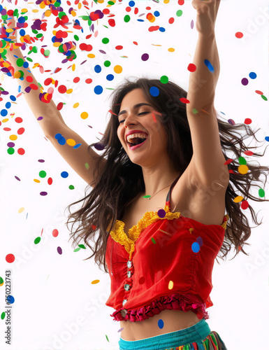 Carnival. A young woman in a red and yellow costume is throwing colorful confetti in the air while dancing happily.