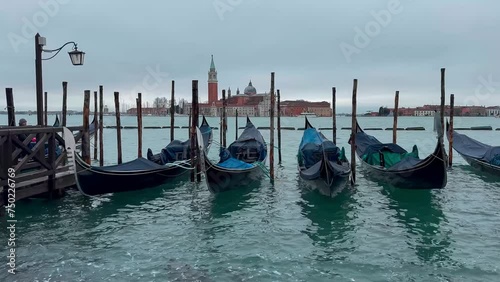 Medieval houses, narrow canals, bridges, gondolas in Venice, Italy, February 10, 2024. High quality 4k footage photo