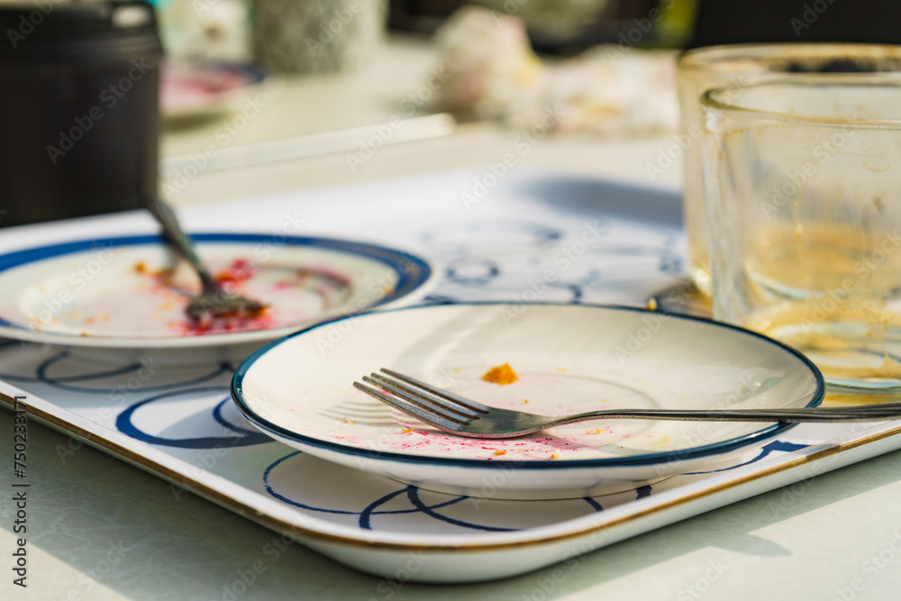 Dirty dishes outdoors after meal is finished. Dirty dishes outdoors after meal is finished.