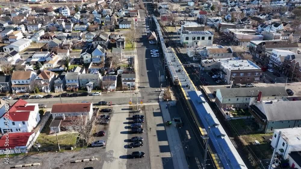 Aerial view of a train arriving into a station in South Amboy, NJ