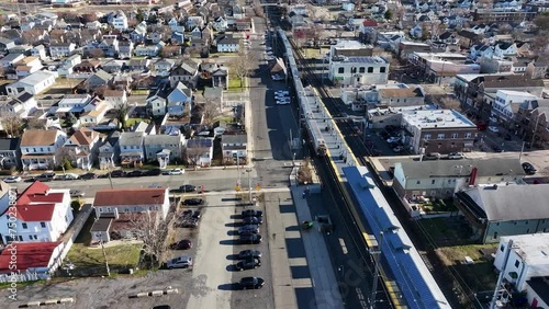 Aerial view of a train arriving into a station in South Amboy, NJ