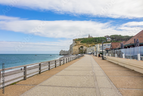 Etretat - turquoise sea and alabaster cliff  Etretat is a commune in the Seine-Maritime department in the Haute-Normandie region in northwestern France. Etretat is now a famous French seaside resort.