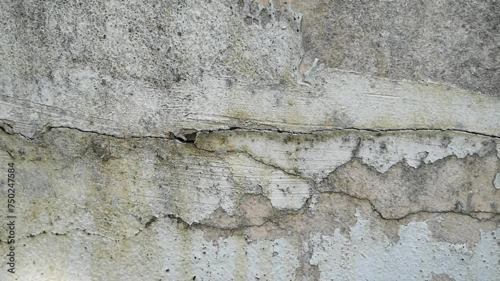 Old concrete wall texture large crack and dirty wall surface with large damage.