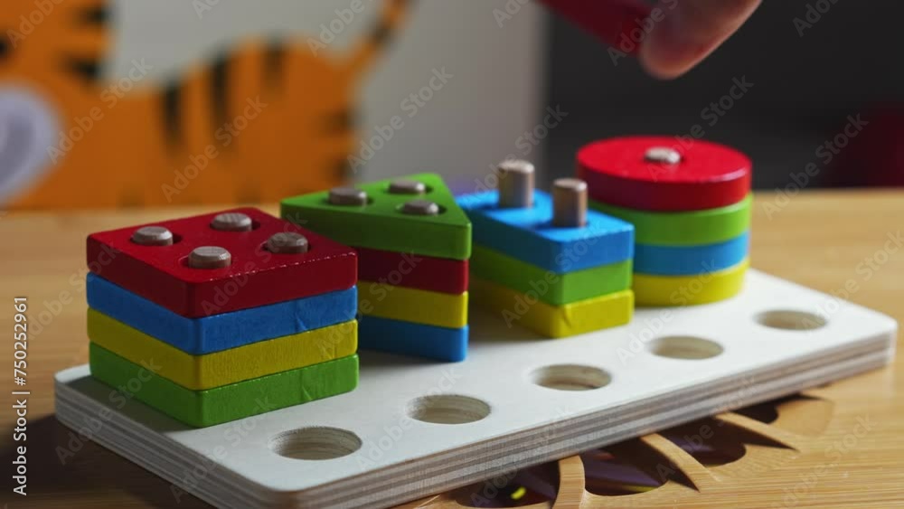 Hands skillfully manipulate colorful construction pieces, crafting amazing shapes and structures. Perfect video for inspiring creativity and play. Hands skillfully manipulate colorful construction pieces, crafting amazing shapes and structures. Perfect video for inspiring creativity and play.