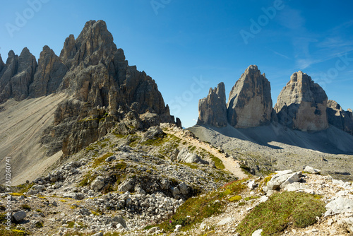 Scenic view of Paternkofel mountain and ridge of rocky battlements of Three Peaks in Sexten Dolomites of northeastern Italy on sunny autumn day..
