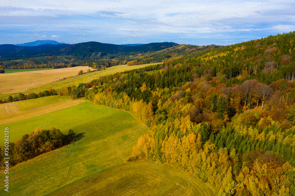 Panoramic countryside autumn view of hills and fields