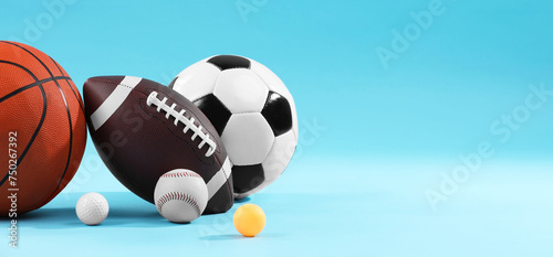 Many different sports balls on light blue background, space for text. Banner design
