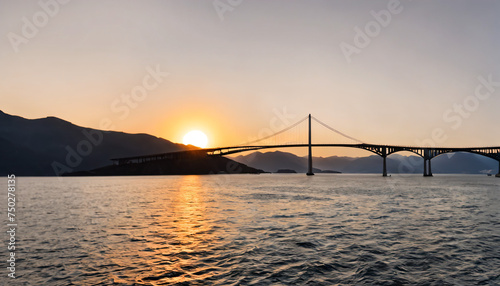 bridge over water at sunset