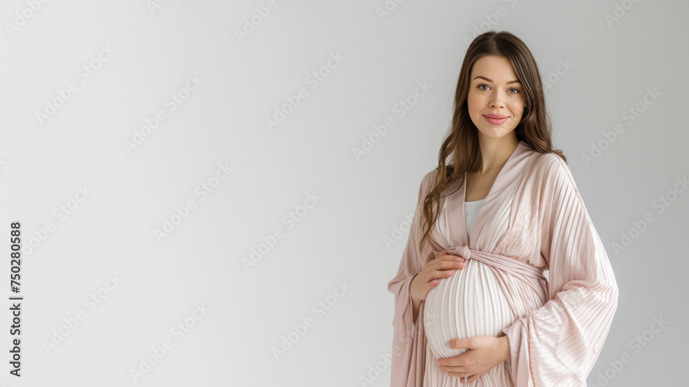 Caucasian pregnant woman with pregnancy belly, in soft pink clothes Caucasian pregnant woman with pregnancy belly, in soft pink clothes