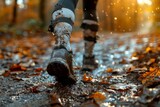 A close-up image showcasing a muddy trail running shoe stepping on wet fallen leaves during an autumn rain