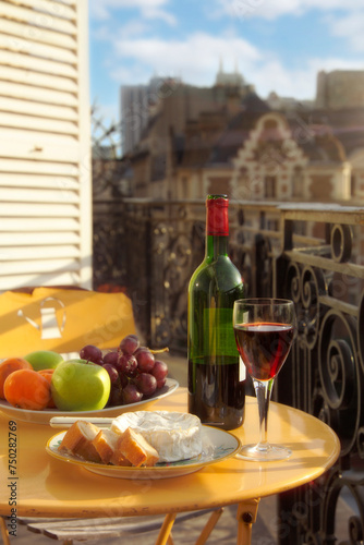 Fototapeta Naklejka Na Ścianę i Meble -  Wine and Cheese on a Paris Balcony