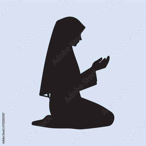 silhouette of a woman praying