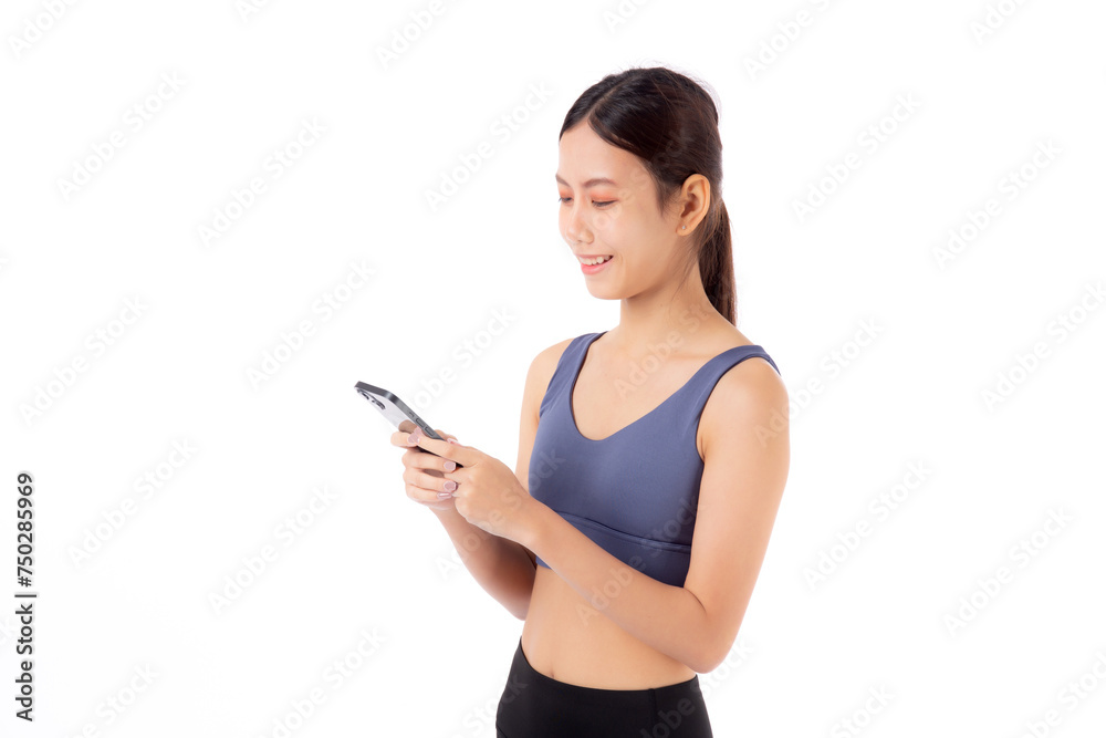 A fit young asian woman in sportswear using a smart phone, possibly managing her fitness routine isolated white background, active woman using smartphone in sportswear, sport and health. A fit young asian woman in sportswear using a smart phone, possibly managing her fitness routine isolated white background, active woman using smartphone in sportswear, sport and health.