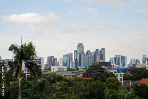 the view of the city of Jakarta is bright, has blue skies and clouds, you can enjoy sitting and relaxing. © AnggunRisky
