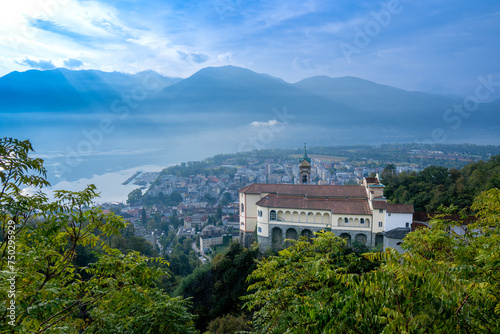 Wallpaper Mural The village of Locarno on the Lago Maggiore, Kanton Ticino, Church Madonna del Sasso, Orselina, Switzerland. Site of Roman Catholic pilgrimage founded after a vision of the Virgin Mary appeared 1480 Torontodigital.ca