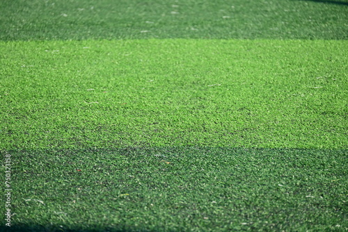 artificial green grass soccer field with sunlight, training football yard © sutichak