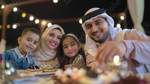 selfie by one of the family , saudian family gathering during Ramadan Night photo