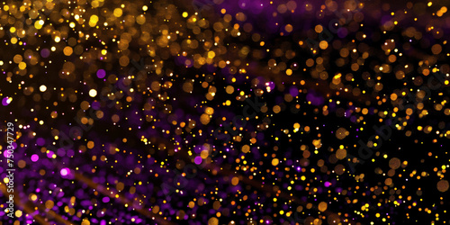 glitter effect and golden particles flowing on a black background, abstract golden glow bokeh light background on dark background, defocused,banner christmas holiday new year background