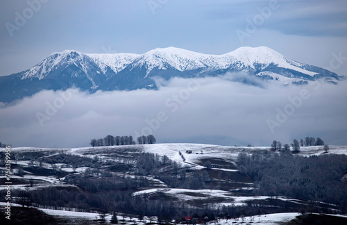 Beautiful landscape with snow covered Rodnei mountains in Carpathian mountains, Romania photo