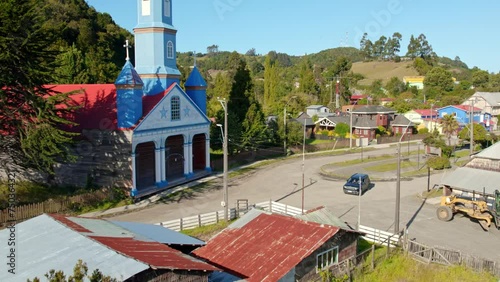 Drone Flyover Tenaun Church, Historical Tenaun Village, Chiloe Island, Chile 4K photo