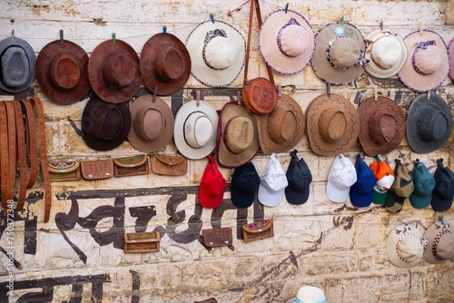 Jaisalmer, Rajasthan, India - 12 January 2024: street market of Jaisalmer, Shop streets in old town Jaisalmer. Handmade leather shoes, bags and belt Jaisalmer Rajasthan.  photo