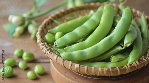 Fresh green beans are neatly arranged in a ceramic bowl, showcasing their vibrant green color and crisp texture. photo