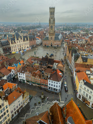 Bruges in Belgium. Birds eye view of the grand place shot with a drone.