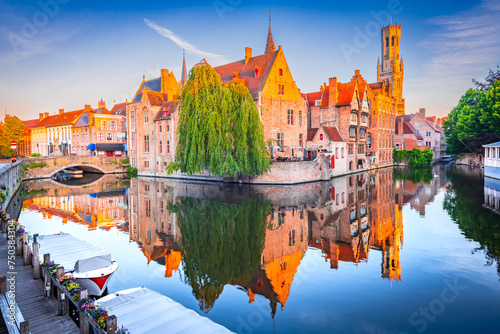 Bruges, Belgium. Rozenhoedkaai Canal in downtown of Brugge, sunrise colors. Famous Flanders destination. photo