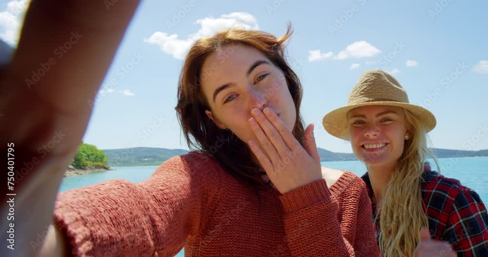 Video call, travel and kiss with friends at sea for social media, memory and explore. Summer, adventure and vacation with face of women and wave at france beach for holiday, spring break and tourism