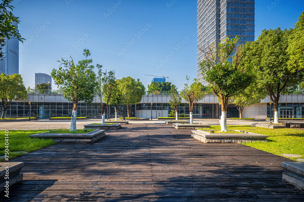 Green Urban Park with Modern Skyscrapers in Background